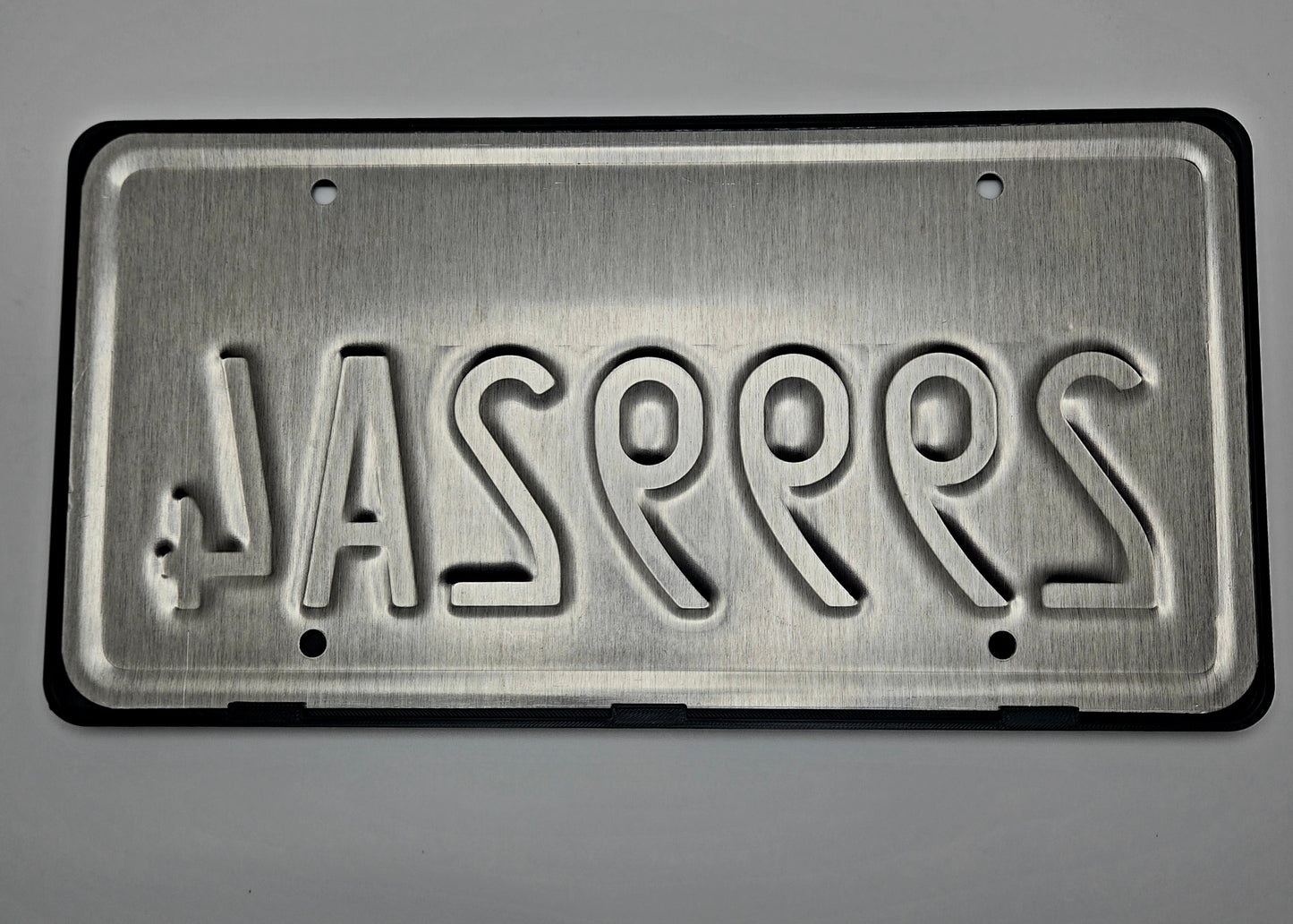 Ford Lightning license plate frame rear with plate close-up