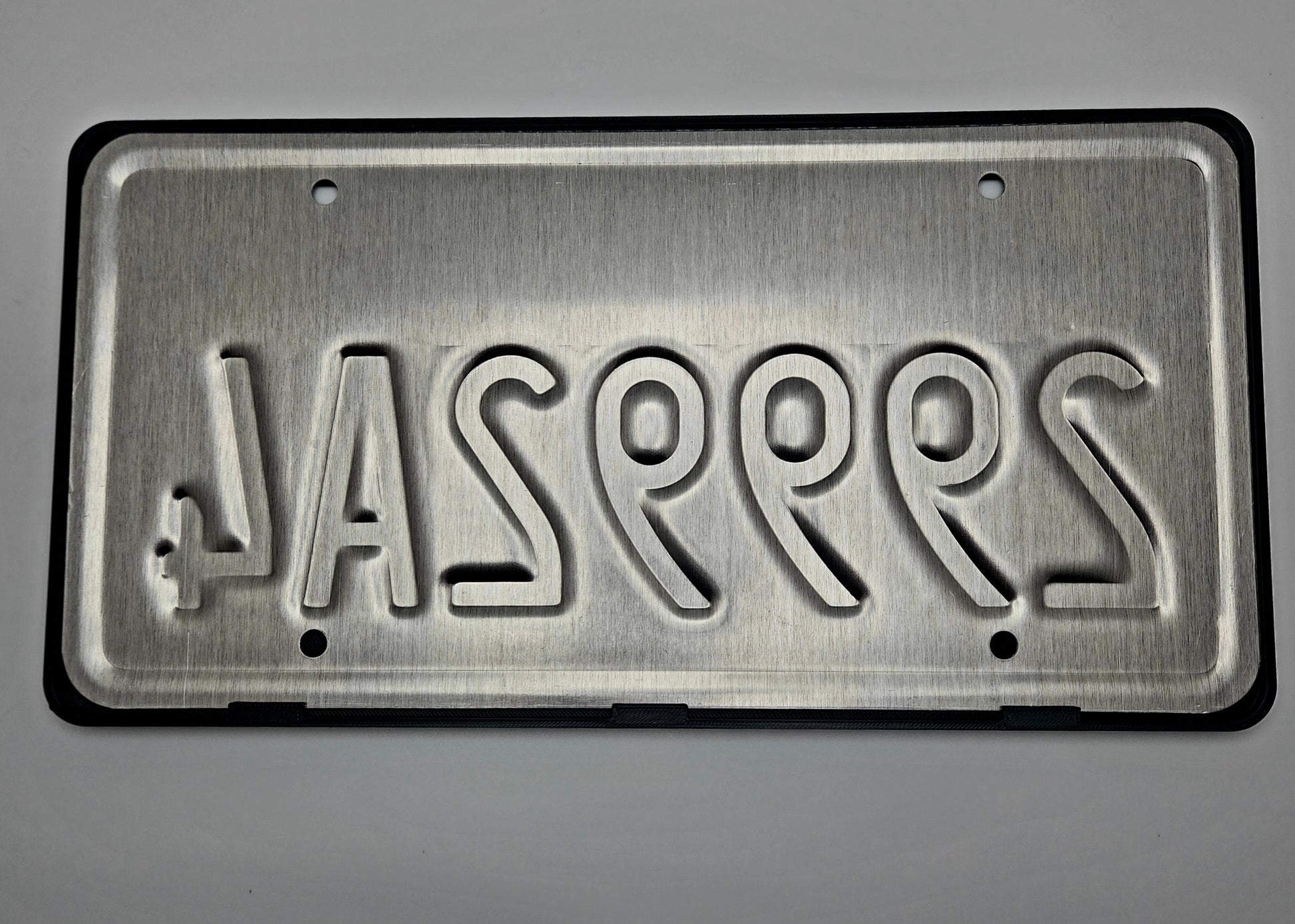 Ford Lightning license plate frame rear with plate close-up