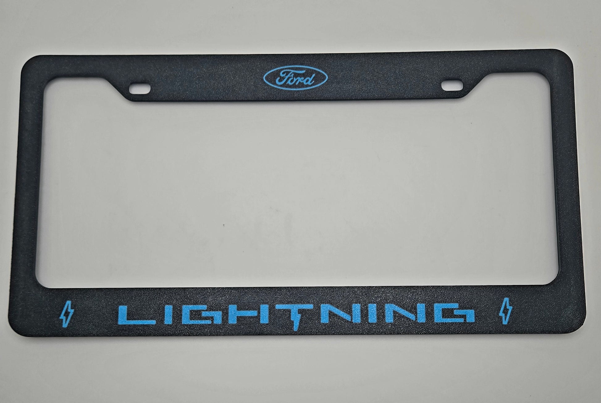Ford F-150 Lightning license plate frame in lightning blue