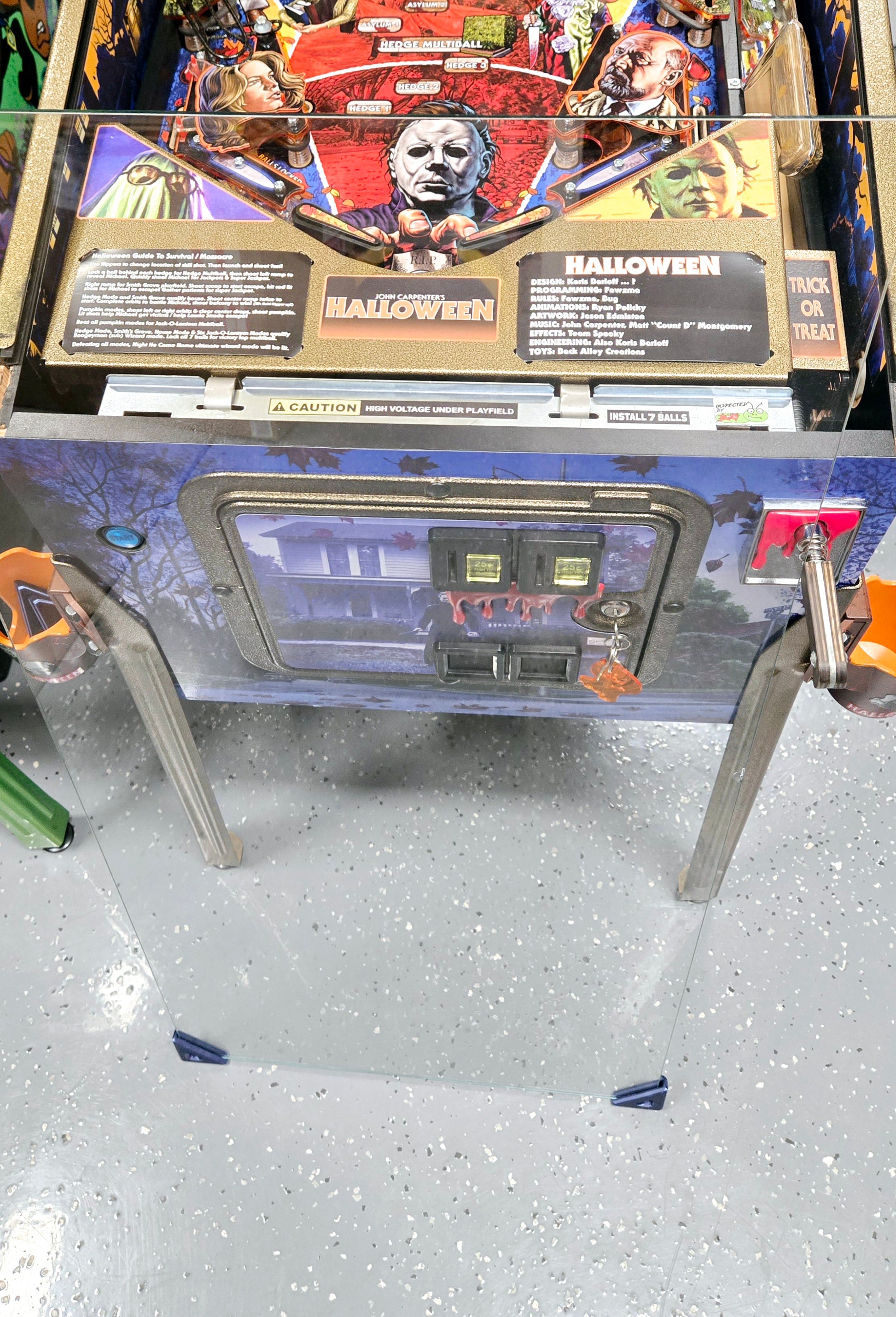 Flexible pinball glass edge guards for safe removal and service
