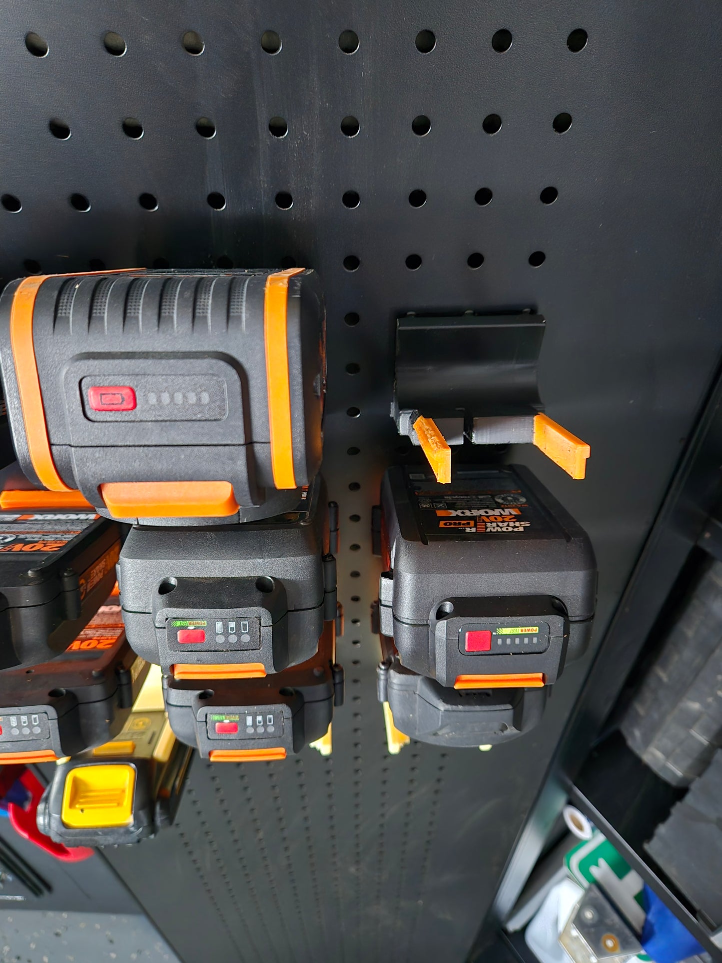 WORX power tool battery holder – 3D printed pegboard mount for shop organization